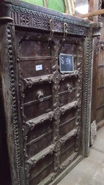 Dark Colored Wooden Door with Frame