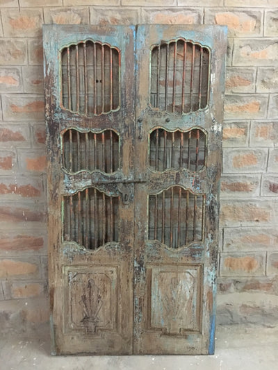 Wood Doors with (3) Openings and Metal Detail
