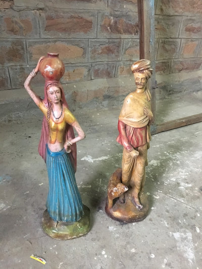 Colorful Statues of Man and Woman