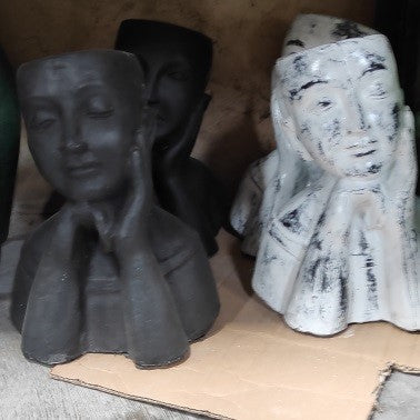 Fiber & Cement Leaning Face Sculpture