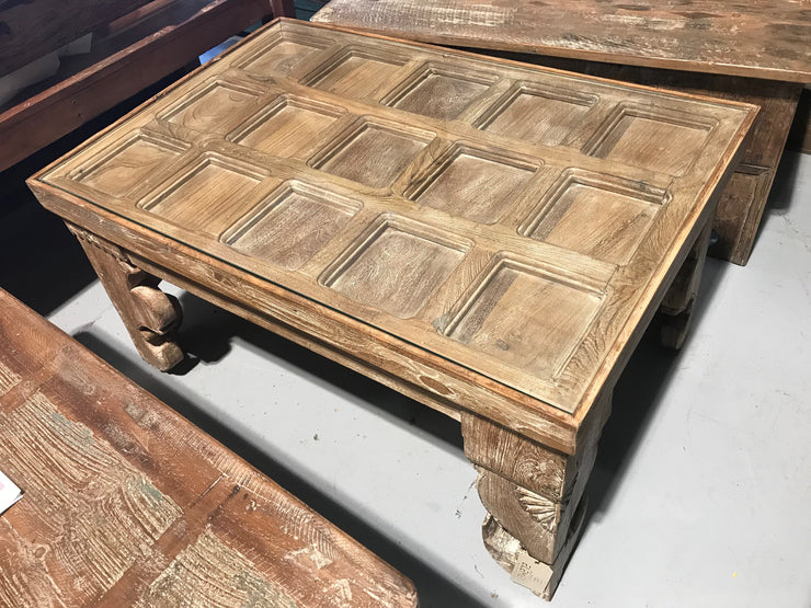 Wooden Coffee Table with Square Carvings and Glass on Top